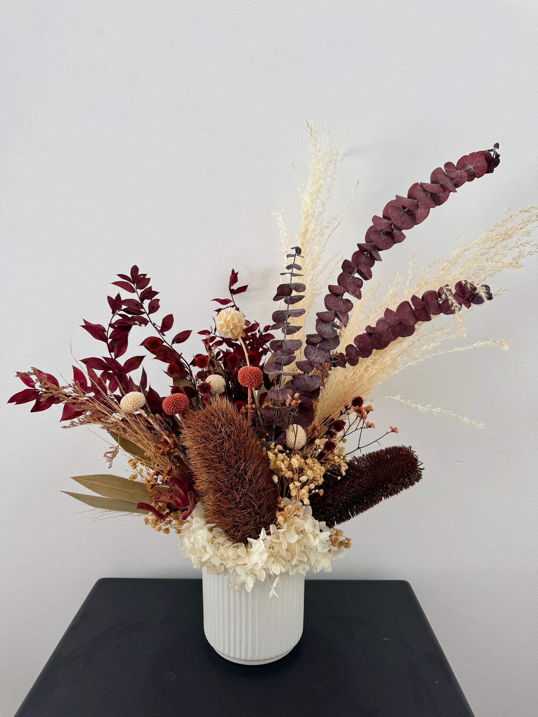 Burgundy in white pot